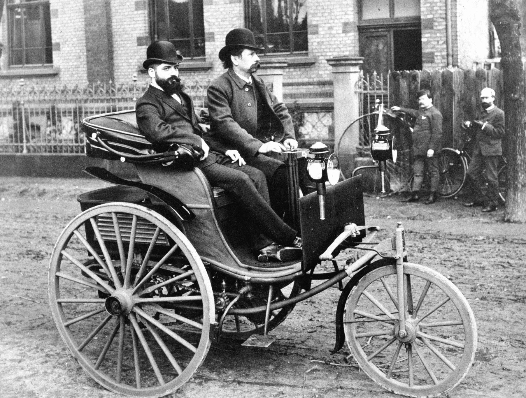 Carl Benz at the tiller of the improved 1887 Benz Patent Motorwagen