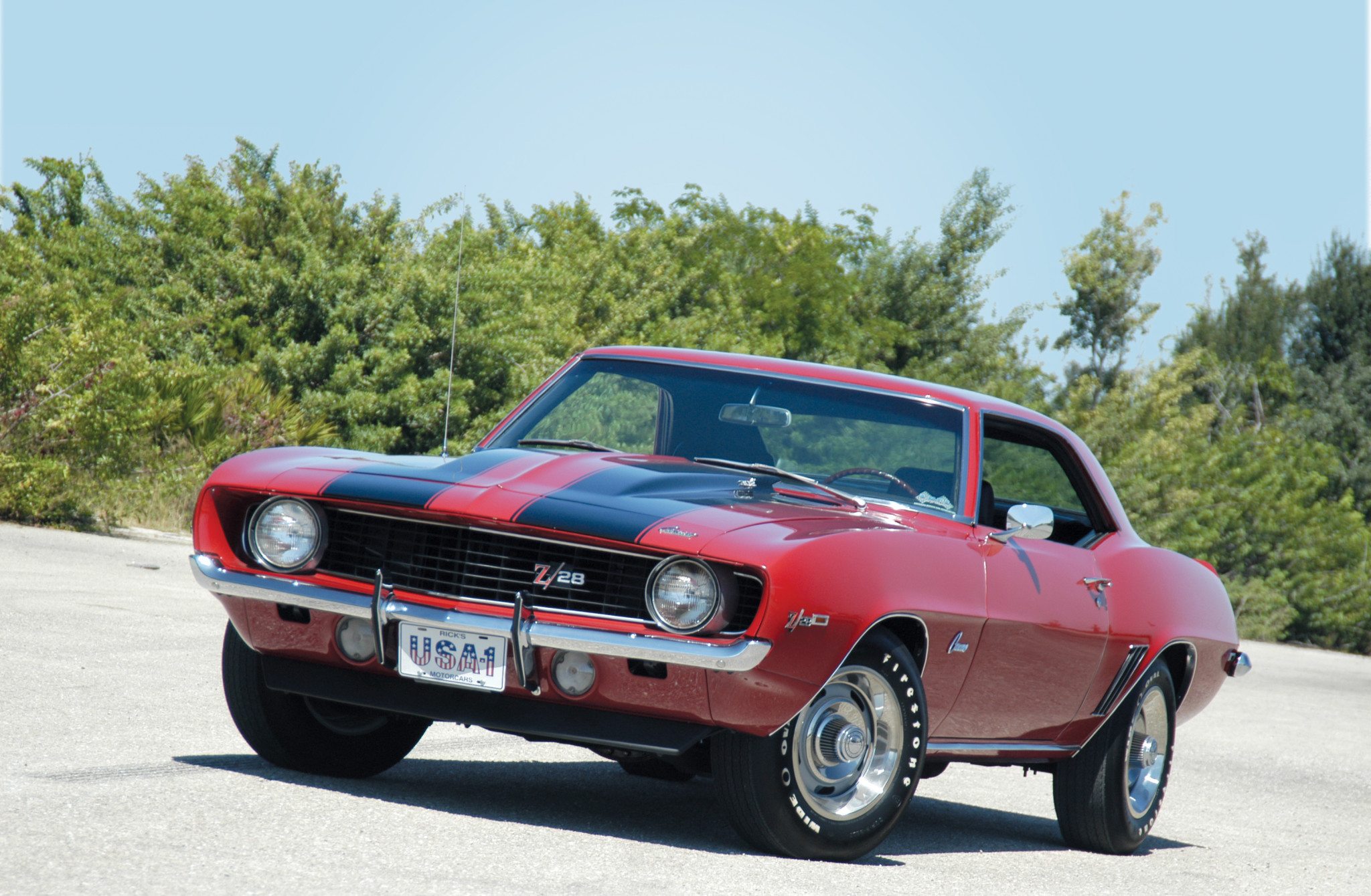 black camaro with red stripes