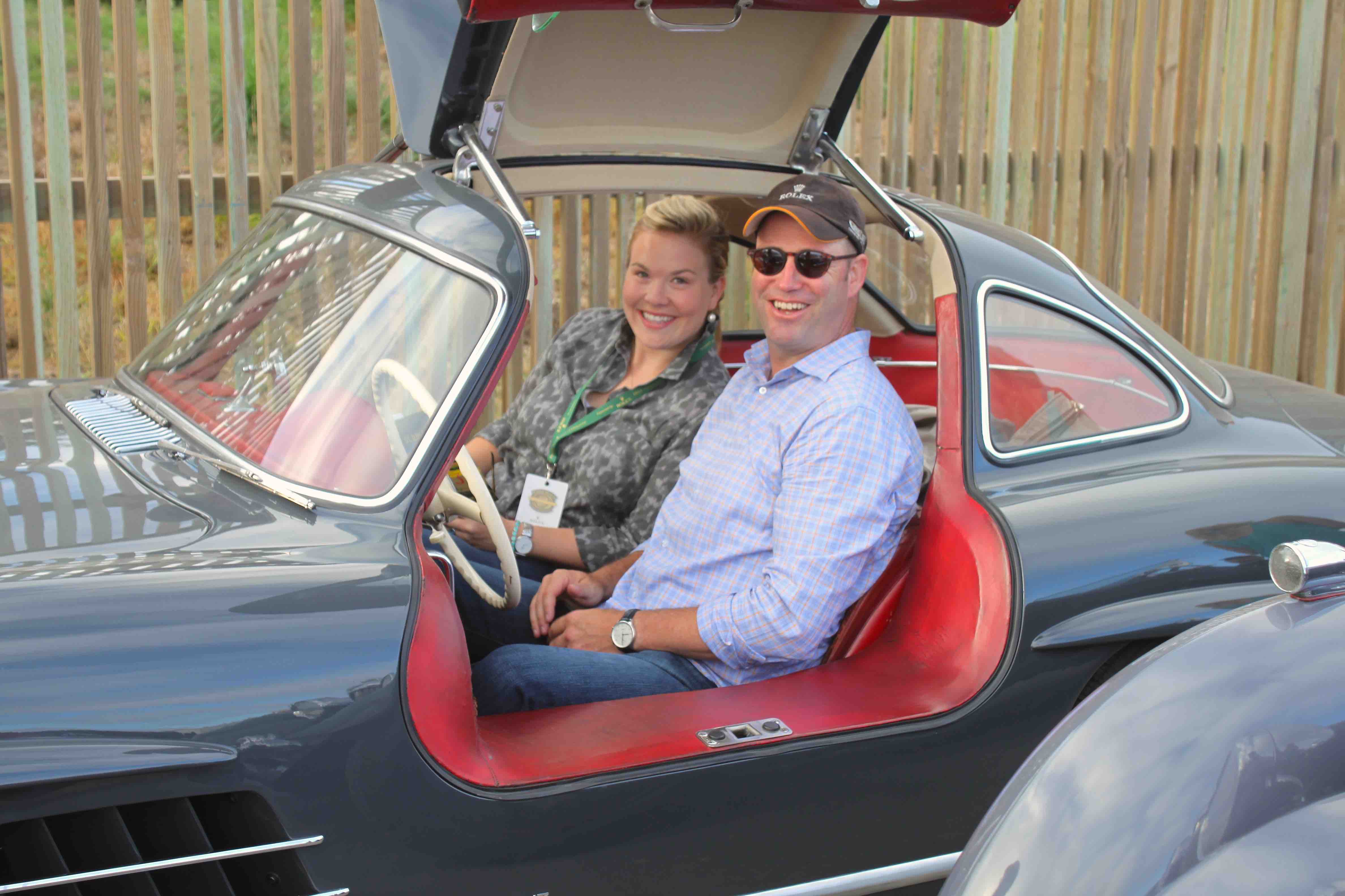 Rod and Veronique 2015 sitting in 300SL gullwing